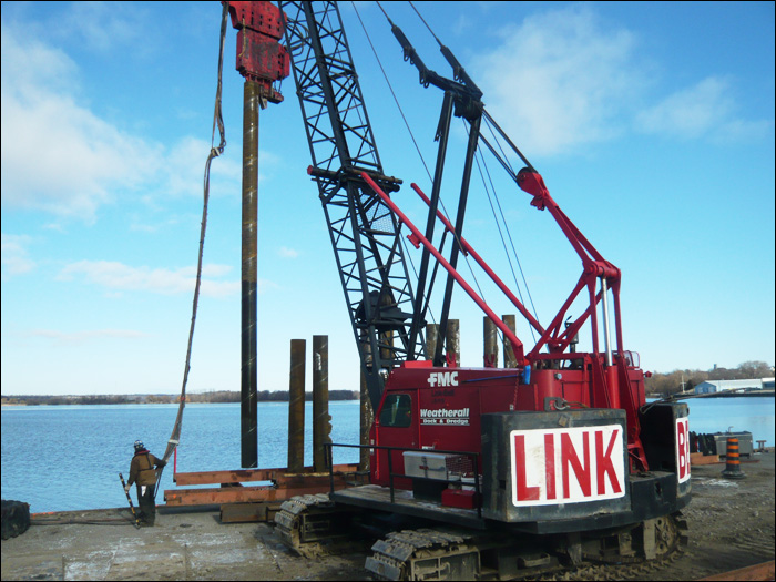 Piles being placed along LaSalle Causeway in Kingston, ON.